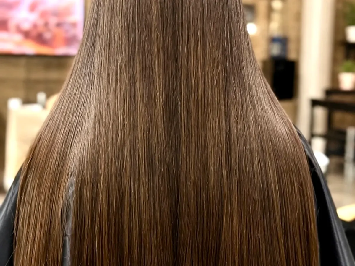Long smooth hair after a Nano Plastia hair treatment at Morning Glory Beauty Clinic in Jhelum.